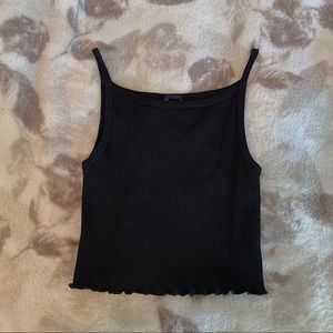 Black cropped tank top with lettuce edge hemming